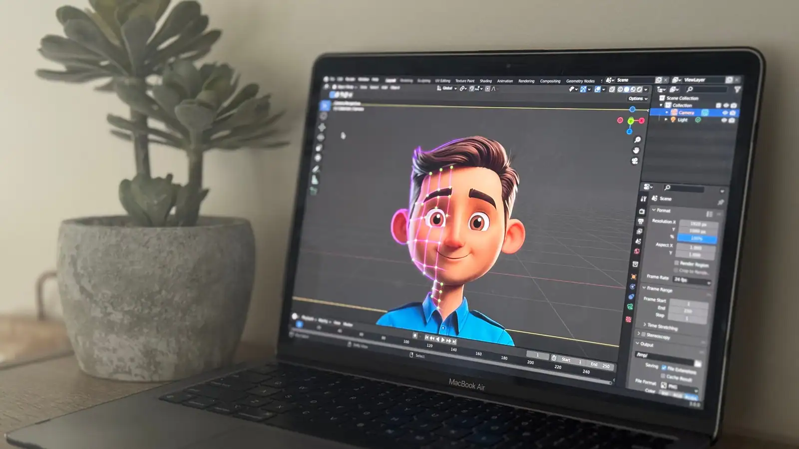 Ordinateur portable affichant un personnage 3D en cours d'animation dans un logiciel de création 3D